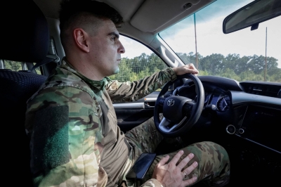 Ukrainian commander sped through ‘kill zone’ to save wounded troops