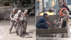 People pulled from mud in Nepal after deadly flash floods
