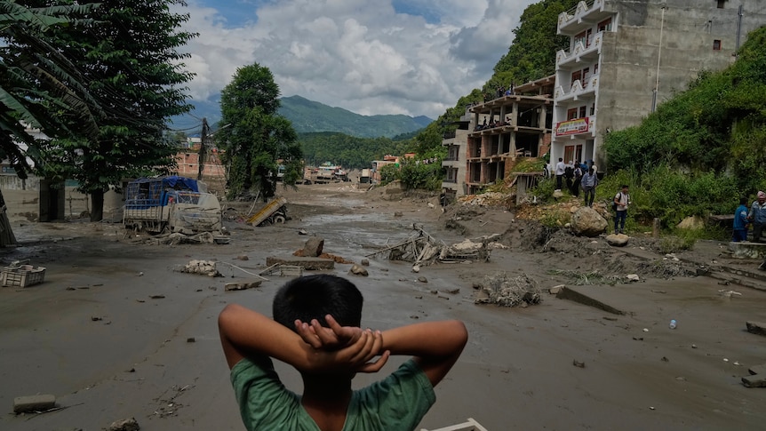 Live: Nepal-Tibet flood kills 392, as Australians remain among hundreds missing