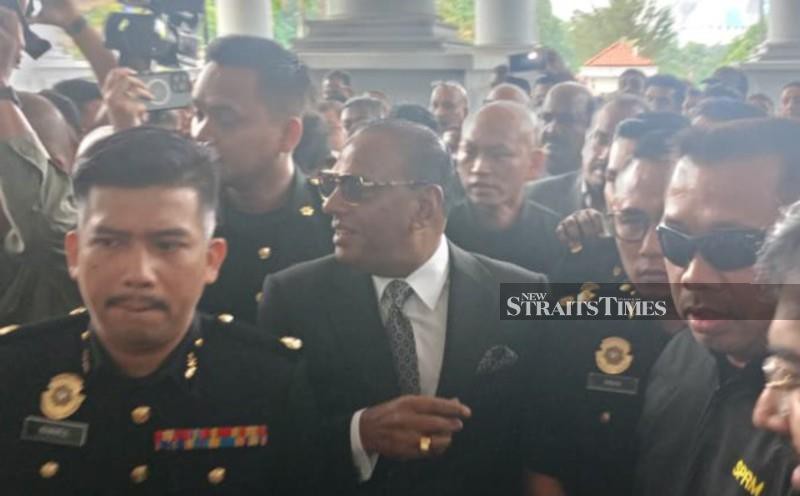 Saravanan enters court to face foreign worker recruitment corruption charges [WATCH]