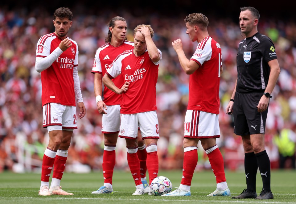 Arsenal lose to Borussia Dortmund as Odegaard returns