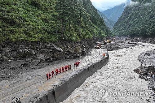 S. Korean rescue teams struggling to reach Nepal flood site as 9 remain missing