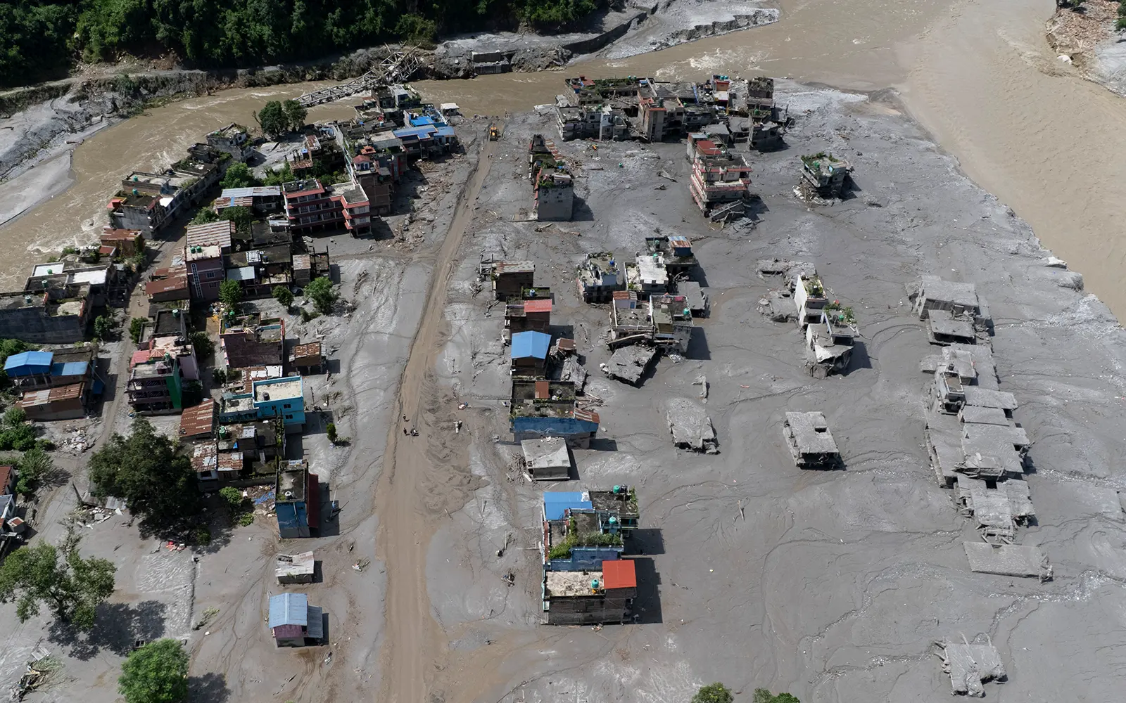2 Malaysians in Nepal flood located, 55 still missing