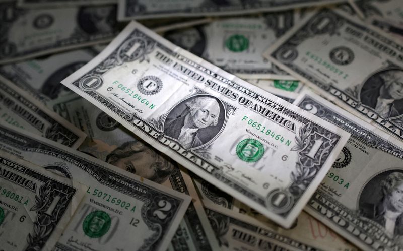 Dollar rises to session high after Warsh comments, set for weekly gain