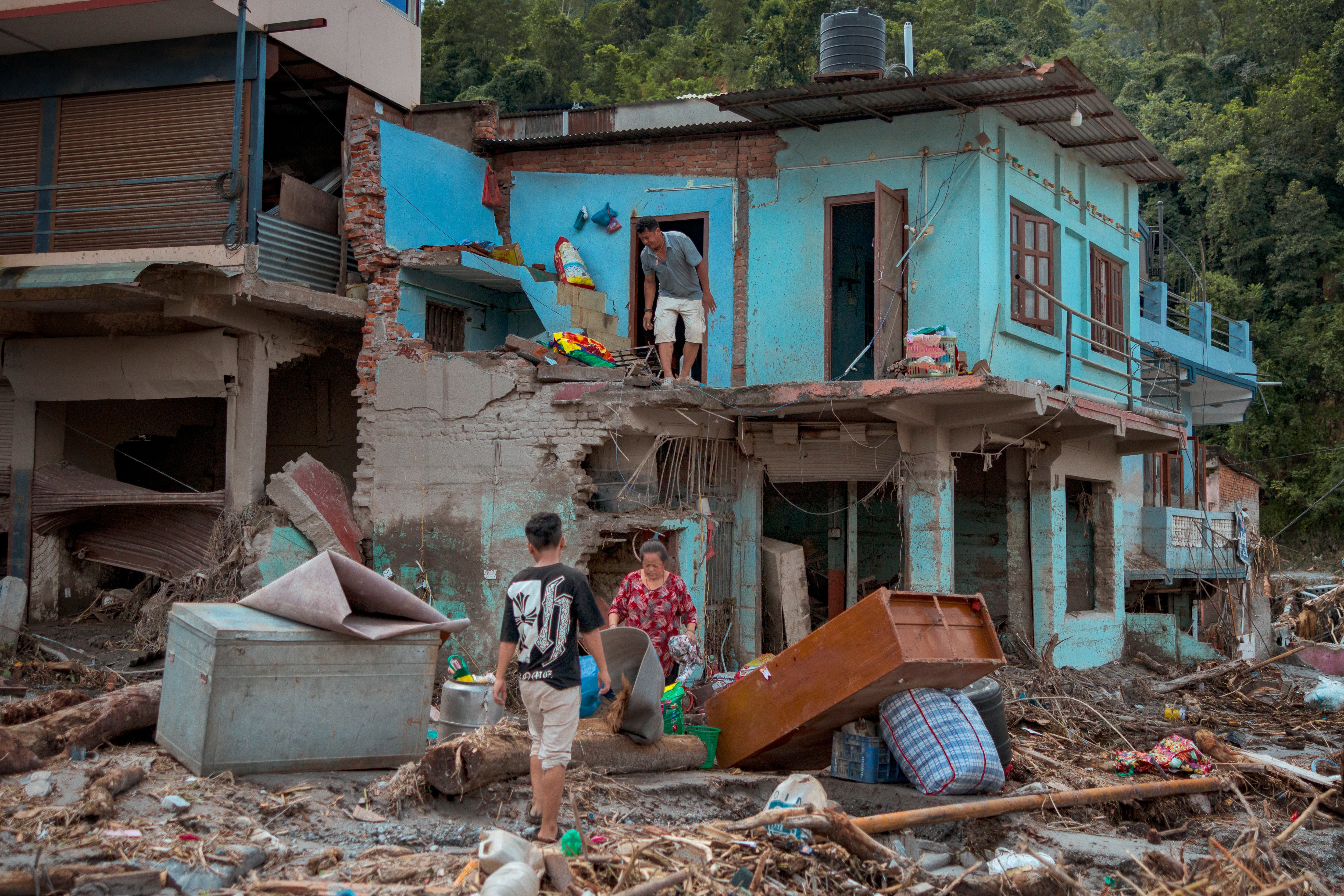 'We are praying': Nepal travel groups search for missing tourists and staff after devastating floods
