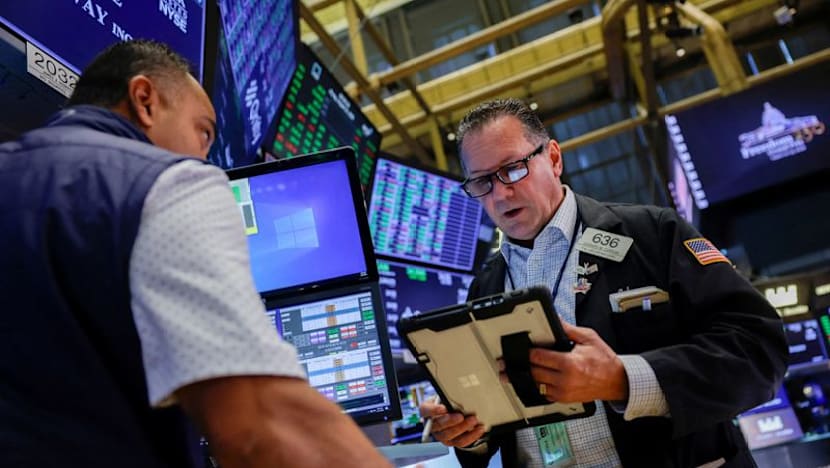 Stocks fall while dollar, bond yields rise as Warsh prompts rate hike bets