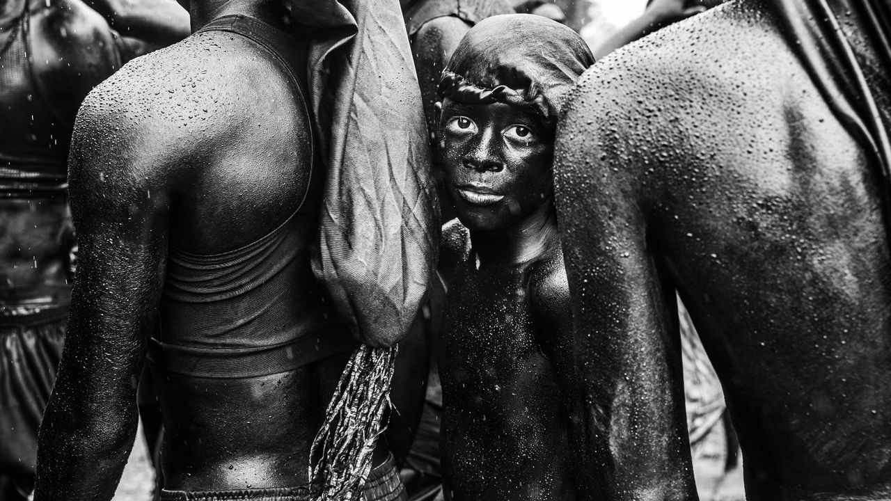 "A cultural legacy passed down from generation to generation. At the heart of the Lambe Sujo and Caboclinhos Festival in Sergipe, a boy looks out at the world through the lens of his heritage," says photographer about multi-award-winning street shot