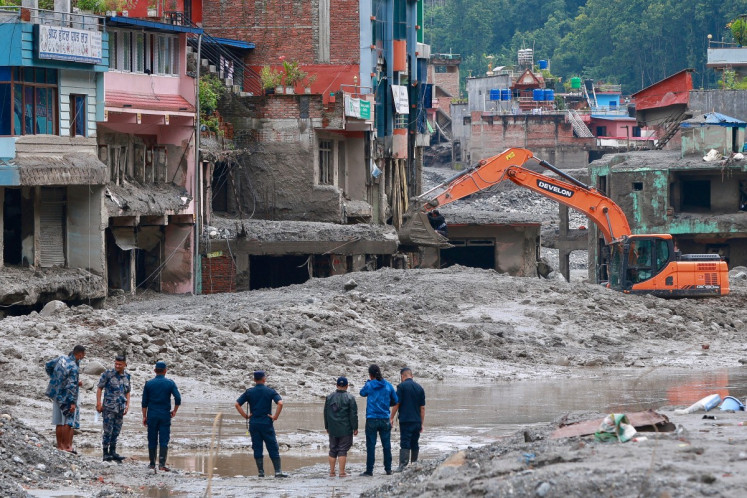 Number of missing in Nepal, China floods soars to nearly 3,000