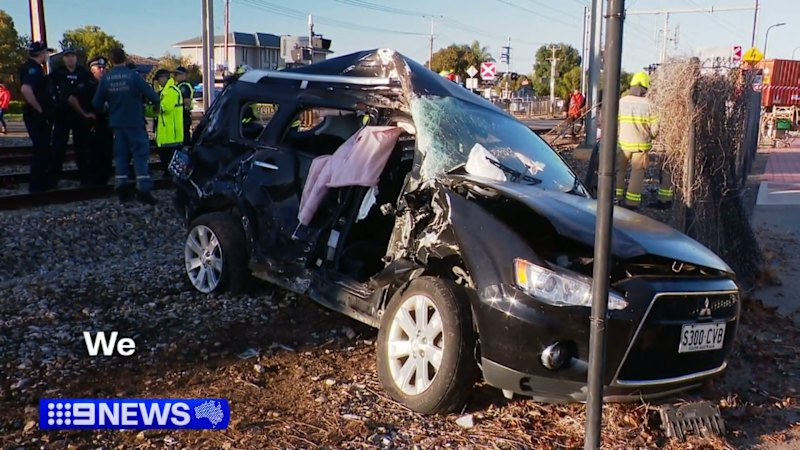 Driver’s brush with death after car drives onto train tracks