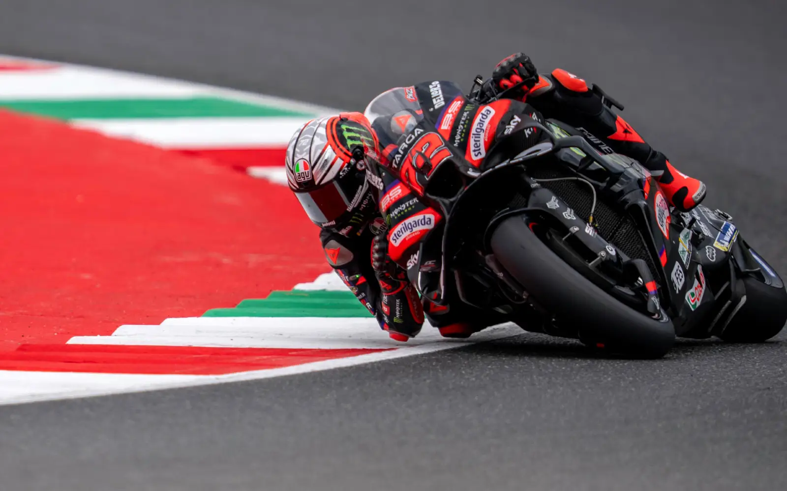 Bezzecchi shatters lap record to beat Marquez brothers to Aragon GP pole
