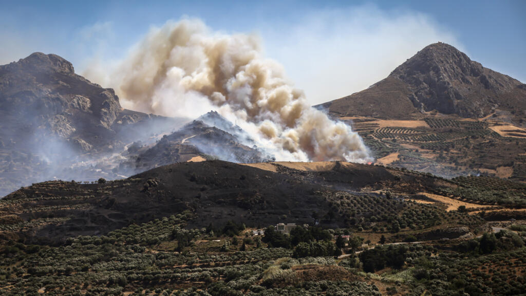 The week in pictures: European wildfires, a woolly mammoth and a migrant influx at Spain's Ceuta