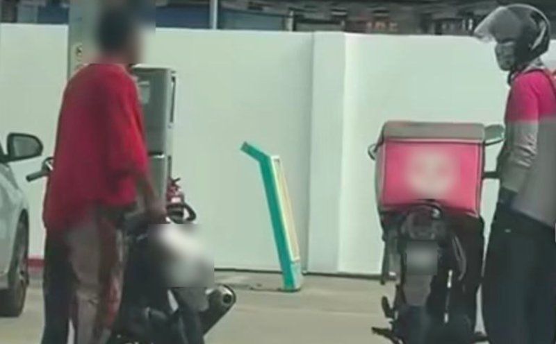 Man held for brandishing cleaver at petrol station