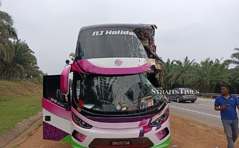 Three religious school students among four injured in Maran bus-trailer crash