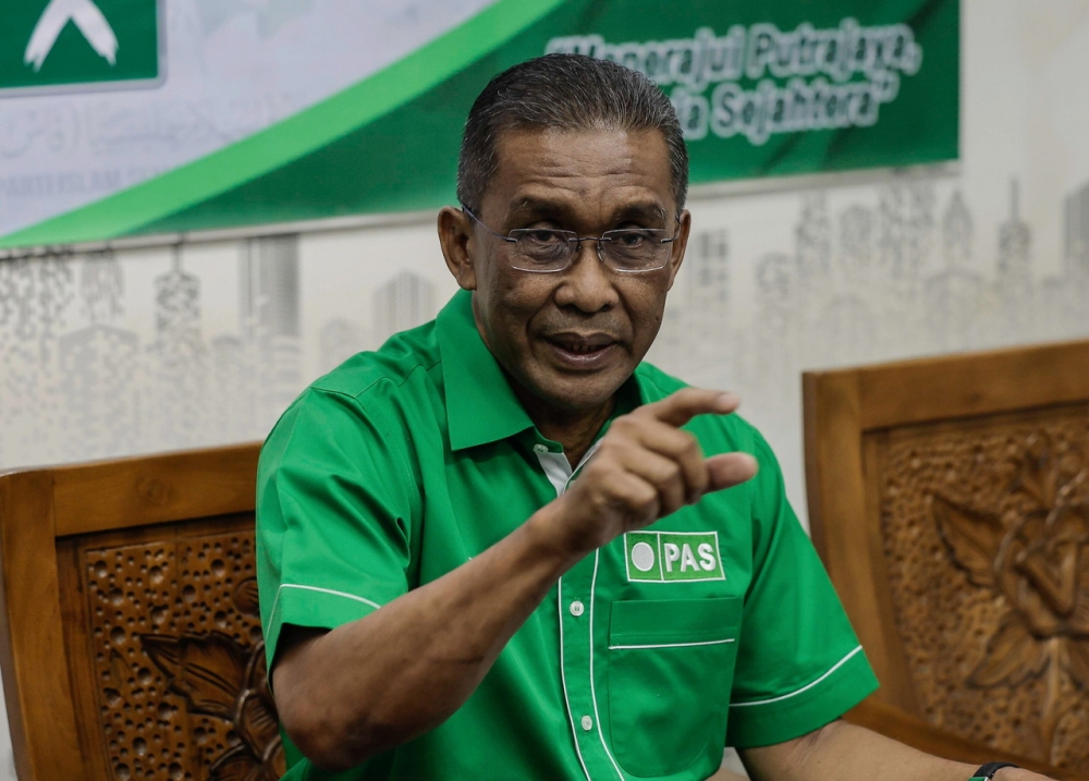 Takiyuddin says PAS has no offers to join unity government, will await DAP’s decision