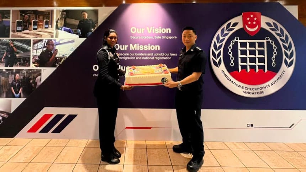 Malaysia and Singapore border teams mark National Day with cross-Causeway greetings