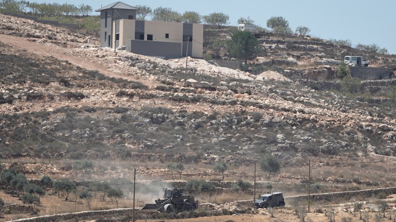 Israeli settlers attack Palestinians, drawing sharp rebukes