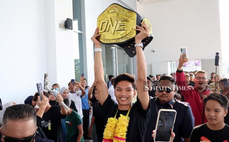 Muay Thai champion Aliff buys RM1 million house for parents