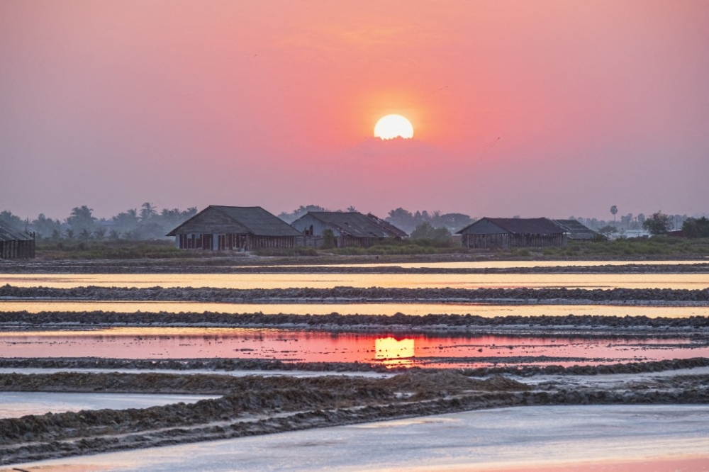 Too much rain, too little sun: Cambodia’s salt farmers face a changing climate
