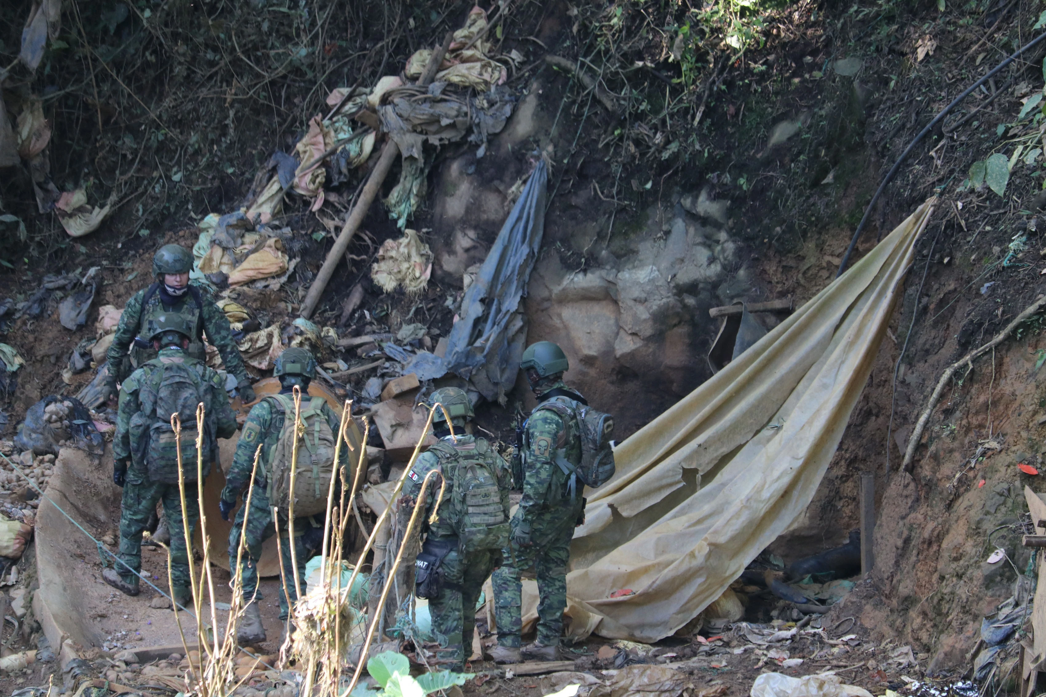 Eight dismembered bodies found in illegal Ecuador mine, say police