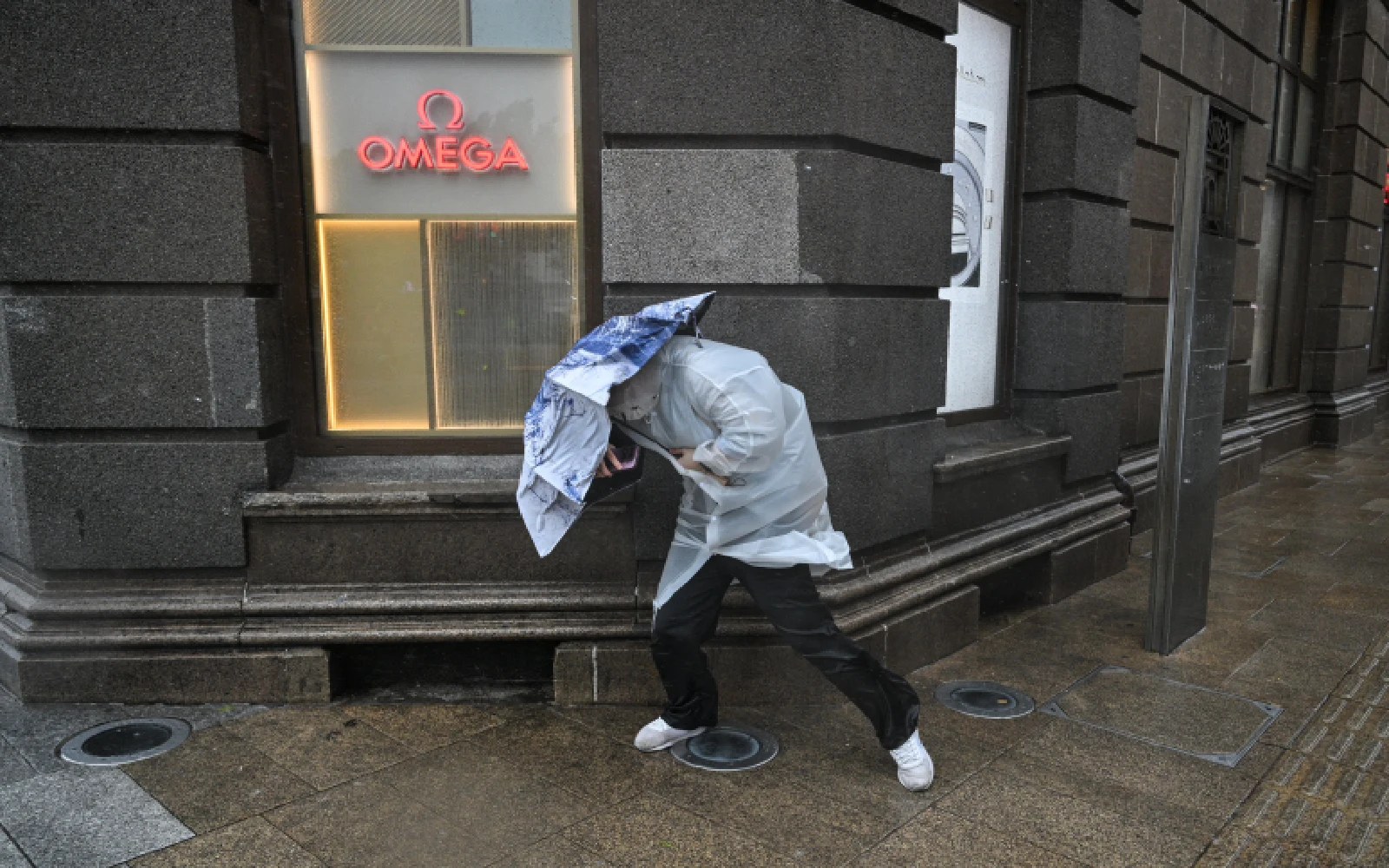 Typhoon Dolphin weakens but disrupts travel in east China