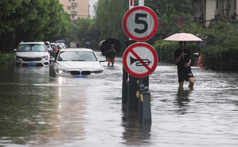 Storms from Dolphin soak China's east, disrupt life in Shanghai