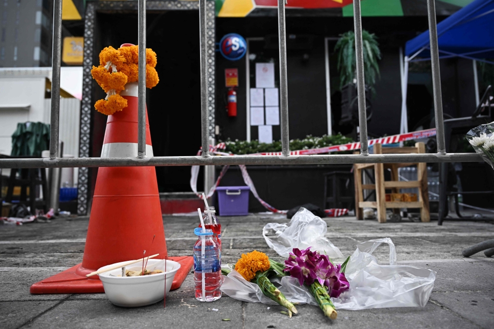 Bangkok bar owner faces up to 10 years over negligence charge after fire kills 37