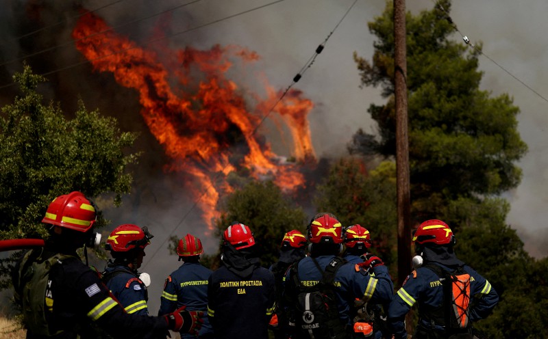 Greece battles new fire near Athens driven by winds
