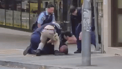 Man allegedly armed with two knives Tasered on busy Sydney street