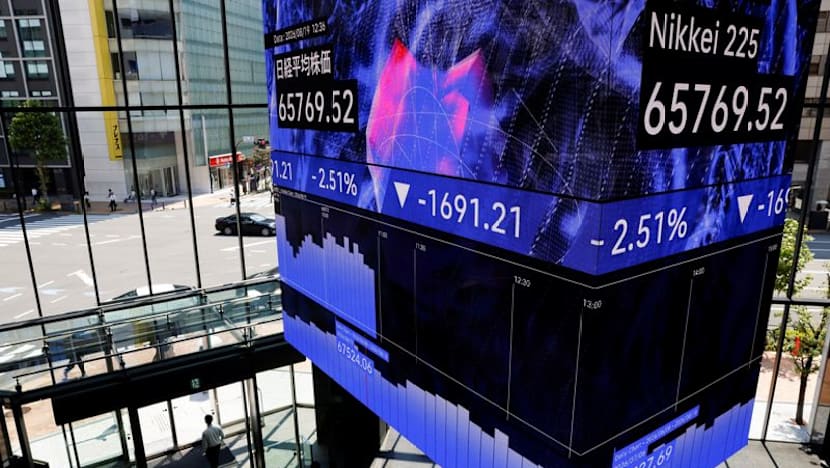 Shares skid in Asia as oil climbs, yields stay high