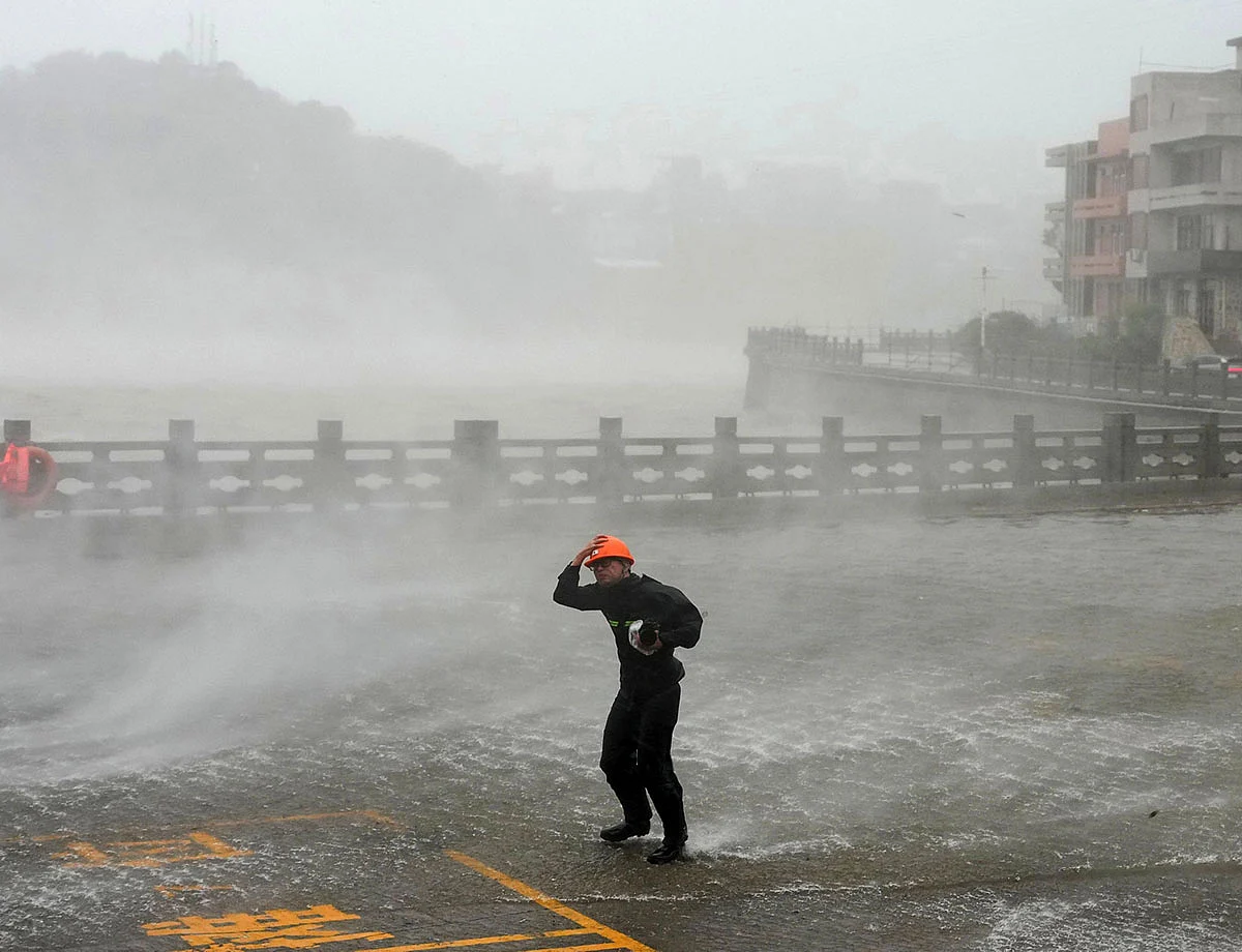 Typhoon Dolphin weakens but disrupts travel in east China