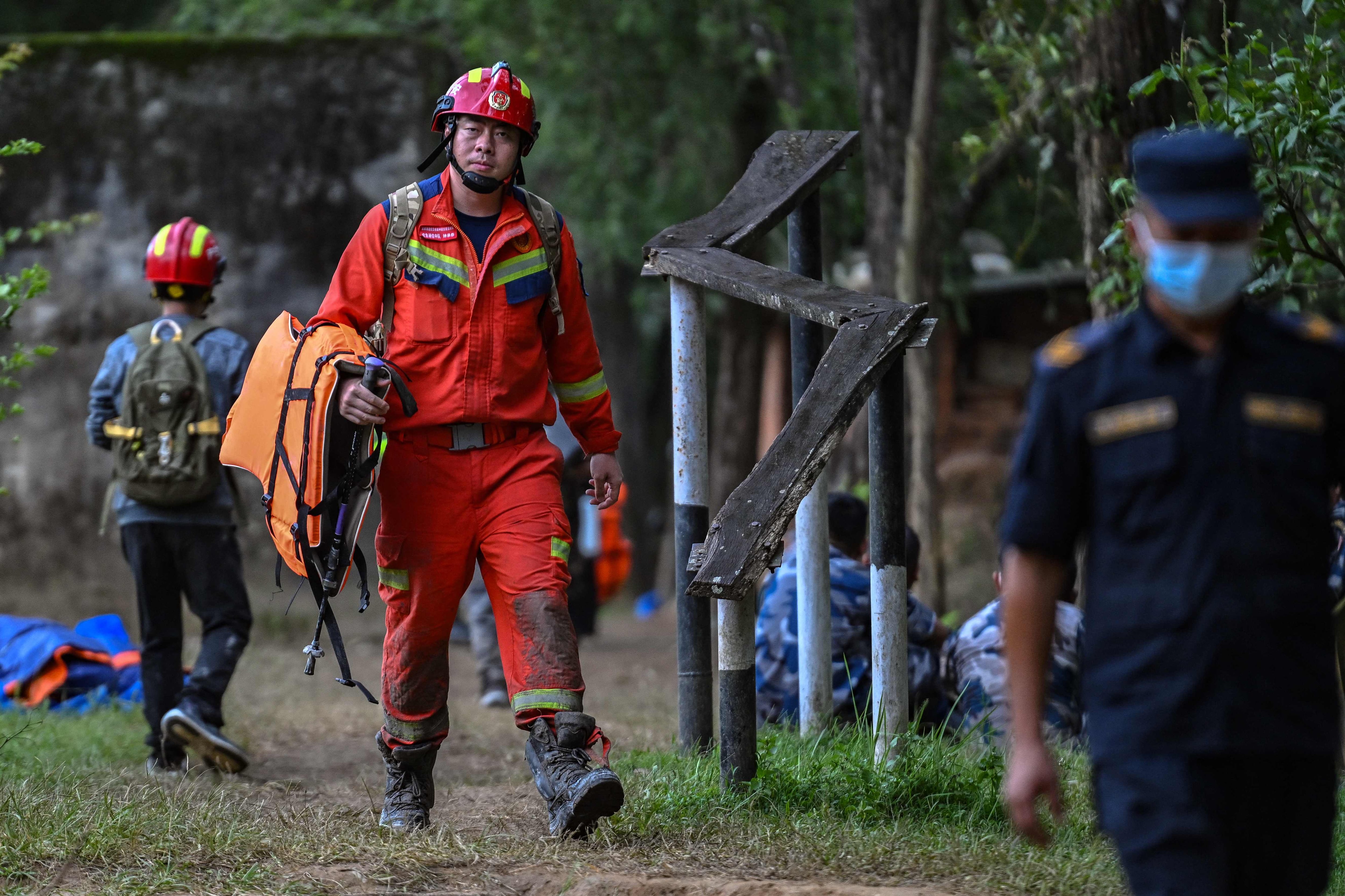 Nepal rescuers turn attention to workers trapped in hydropower tunnels after deadly flood