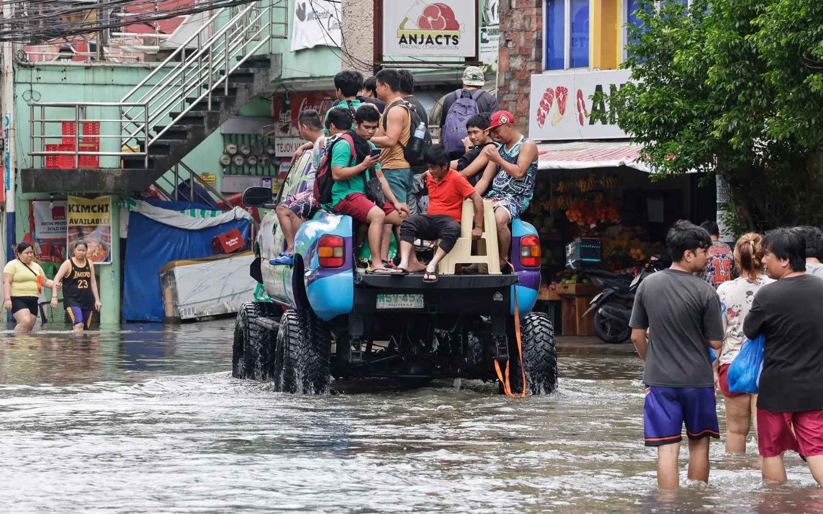 Days of heavy rain leave at least 13 dead in Philippines