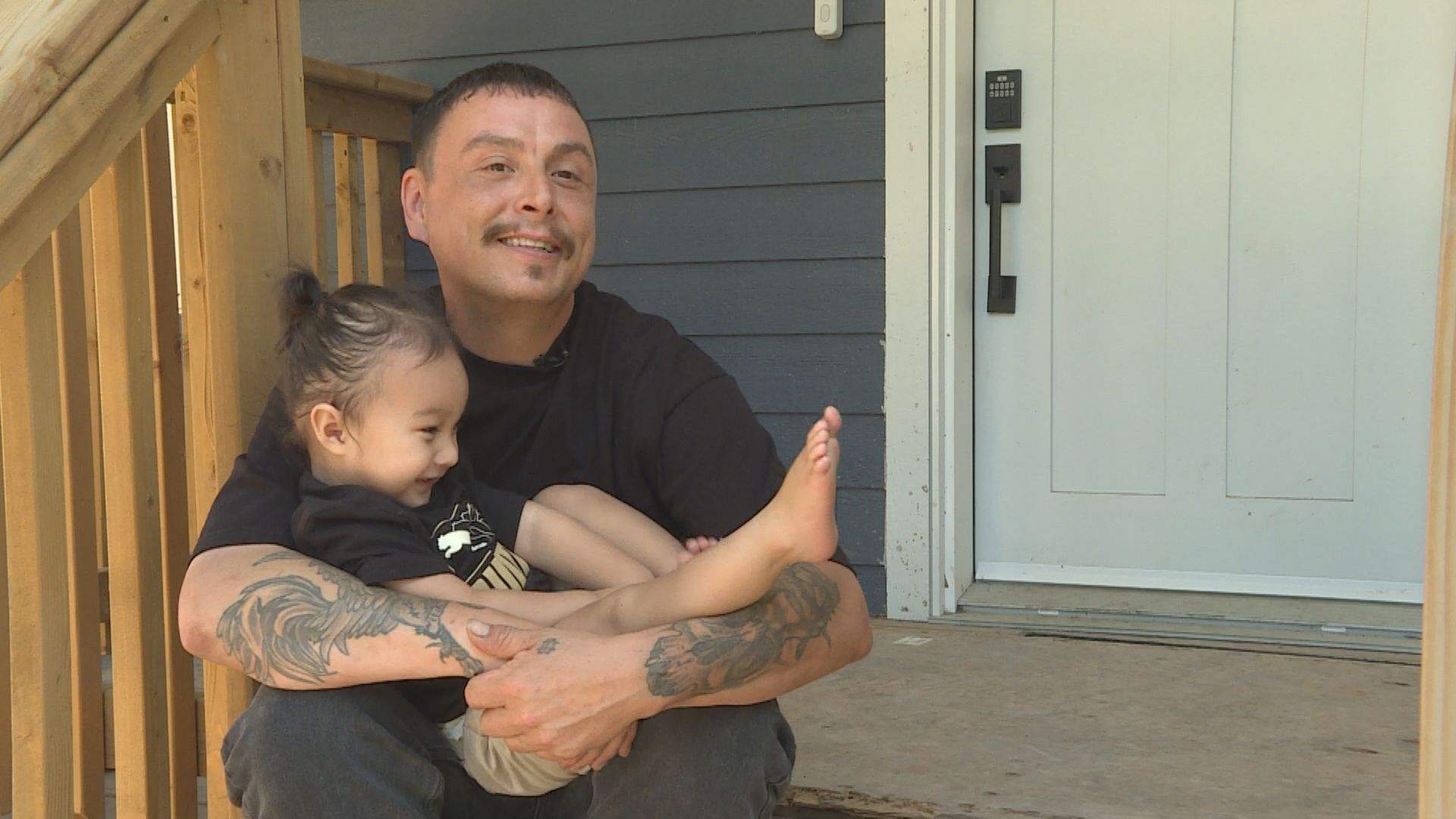 ‘It’s for the kids, and his kids’: Affordable homes from $1 lots in Winnipeg