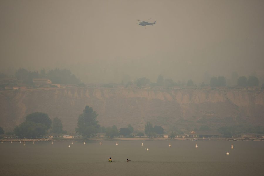 Wildfires burn across western US and Canada as residents are evacuated