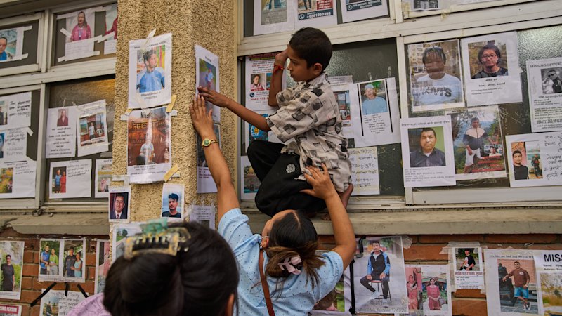 ‘My heart is aching’: Wall of the missing lays bare desperate race to find Nepal victims