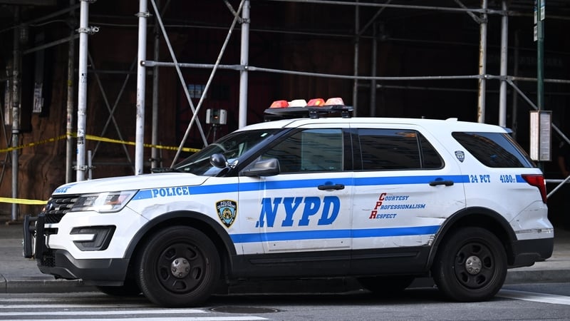 Woman shot by police after stabbing two people in NY