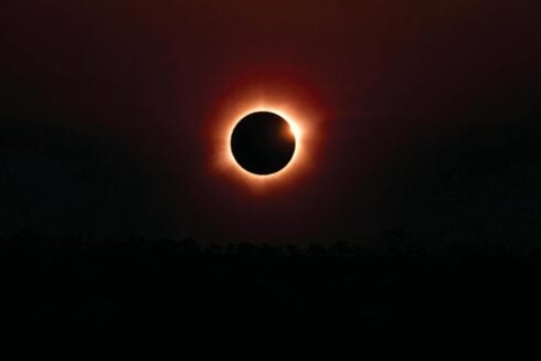 Spain urges wildfire caution as millions prepare to travel to see the total solar eclipse on Wednesday
