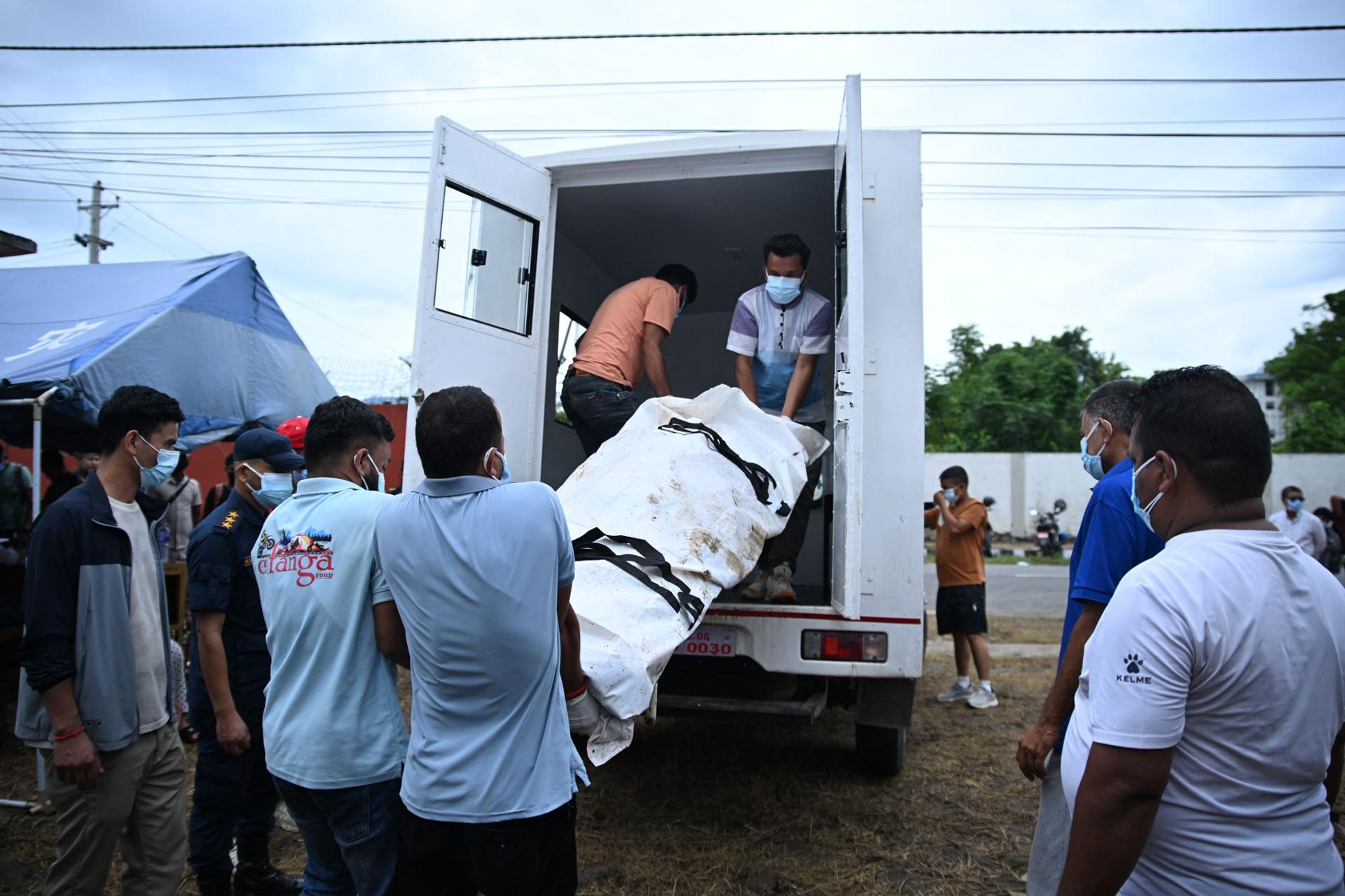 'Giant morgue': Nepal flood victims overwhelm downstream city