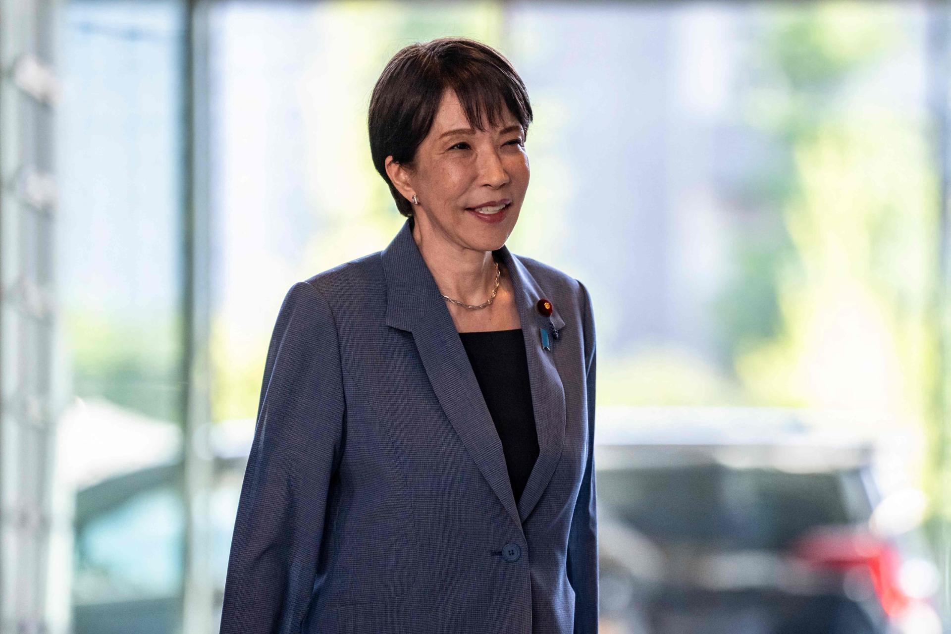Japan to relax overtime regulation under workaholic PM