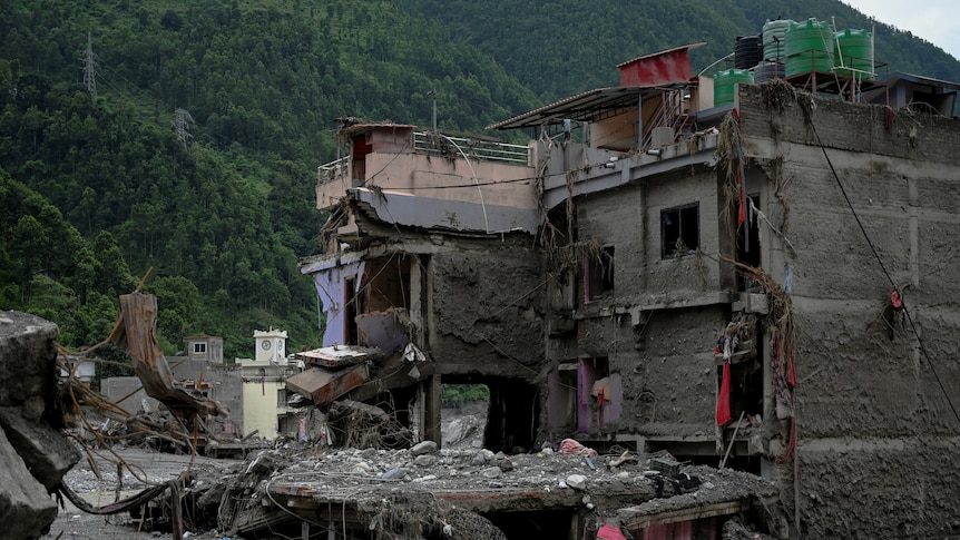 Australian missing in Nepal-Tibet floods found alive
