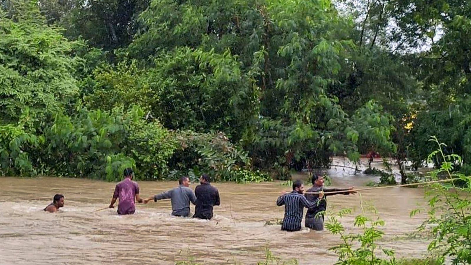 Bid to cross flooded road ends in nine deaths as van slips into drain in Madhya Pradesh