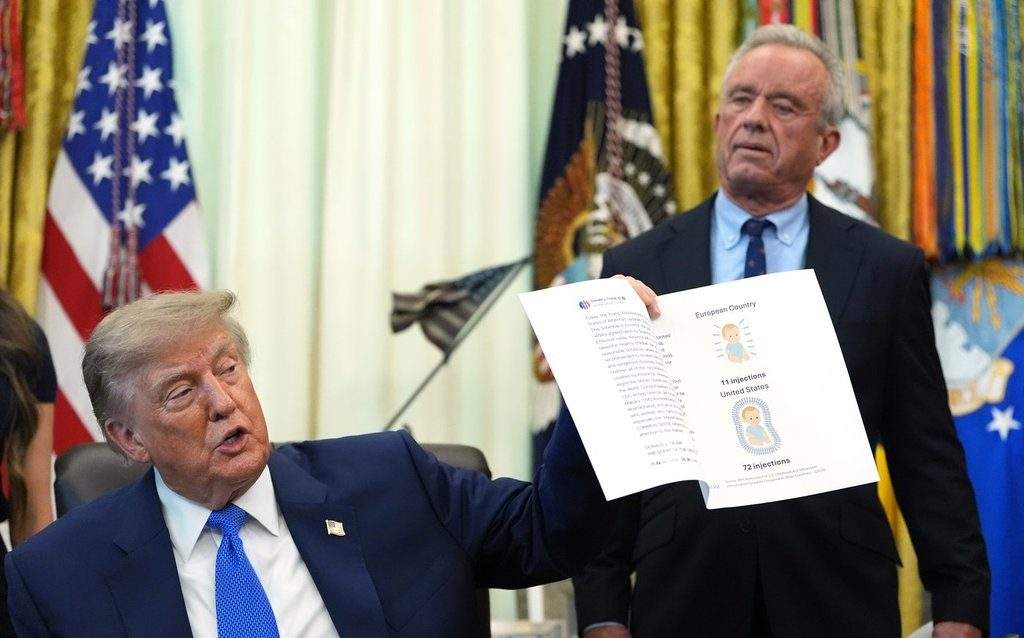 Trump signs order that would space out childhood vaccinations in U.S.