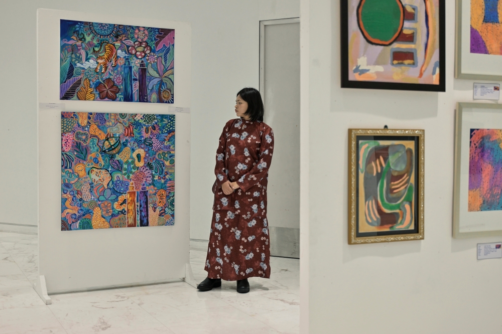Relaxed Tunku portrait steals spotlight at Merdeka Art Exhibition