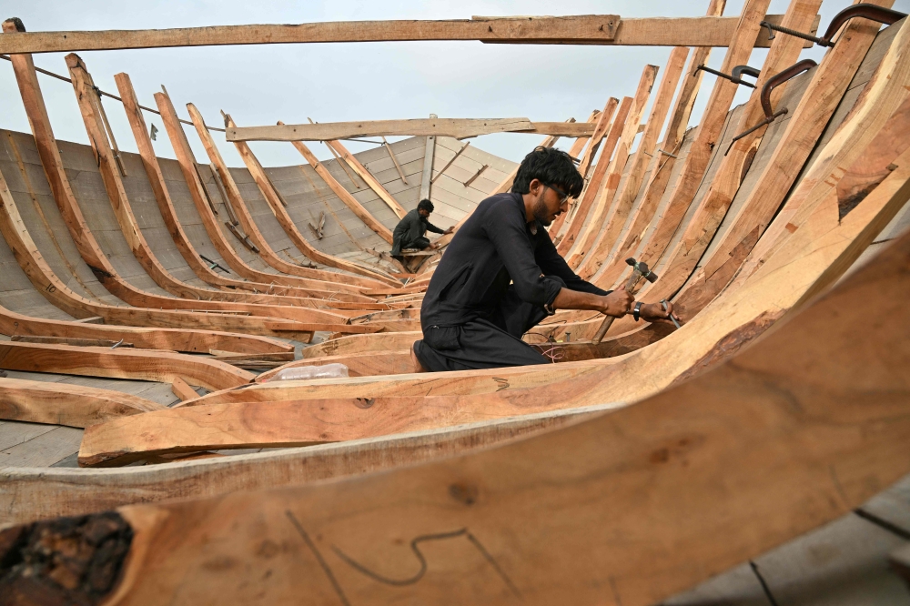 Boat builders keep Pakistan’s fishing heritage afloat