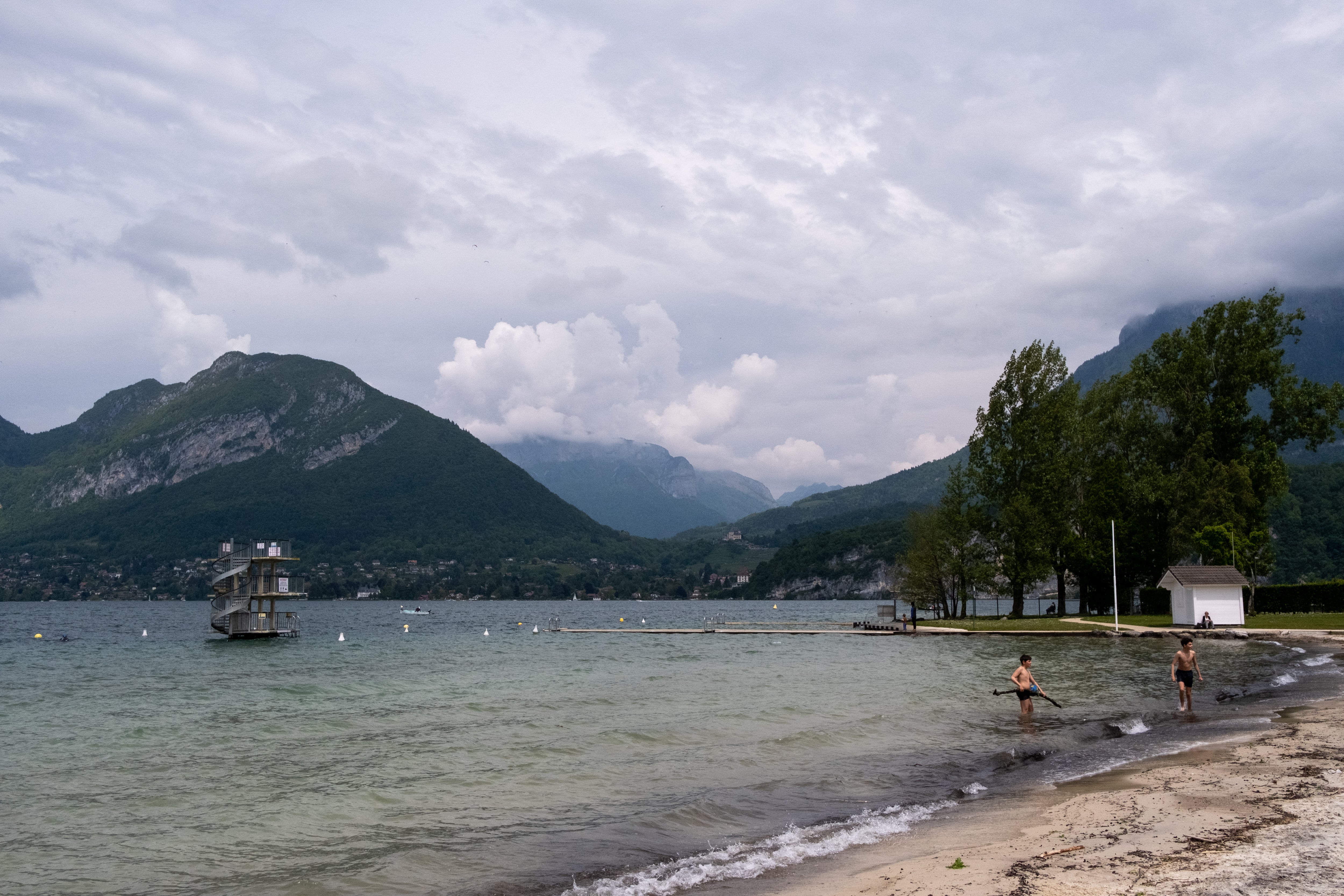 Pistol found in French lake may hold clue to murder mystery of British-Iraqi family