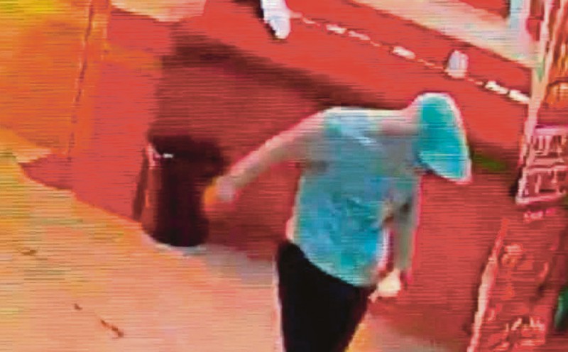 Masked man sets woman on fire