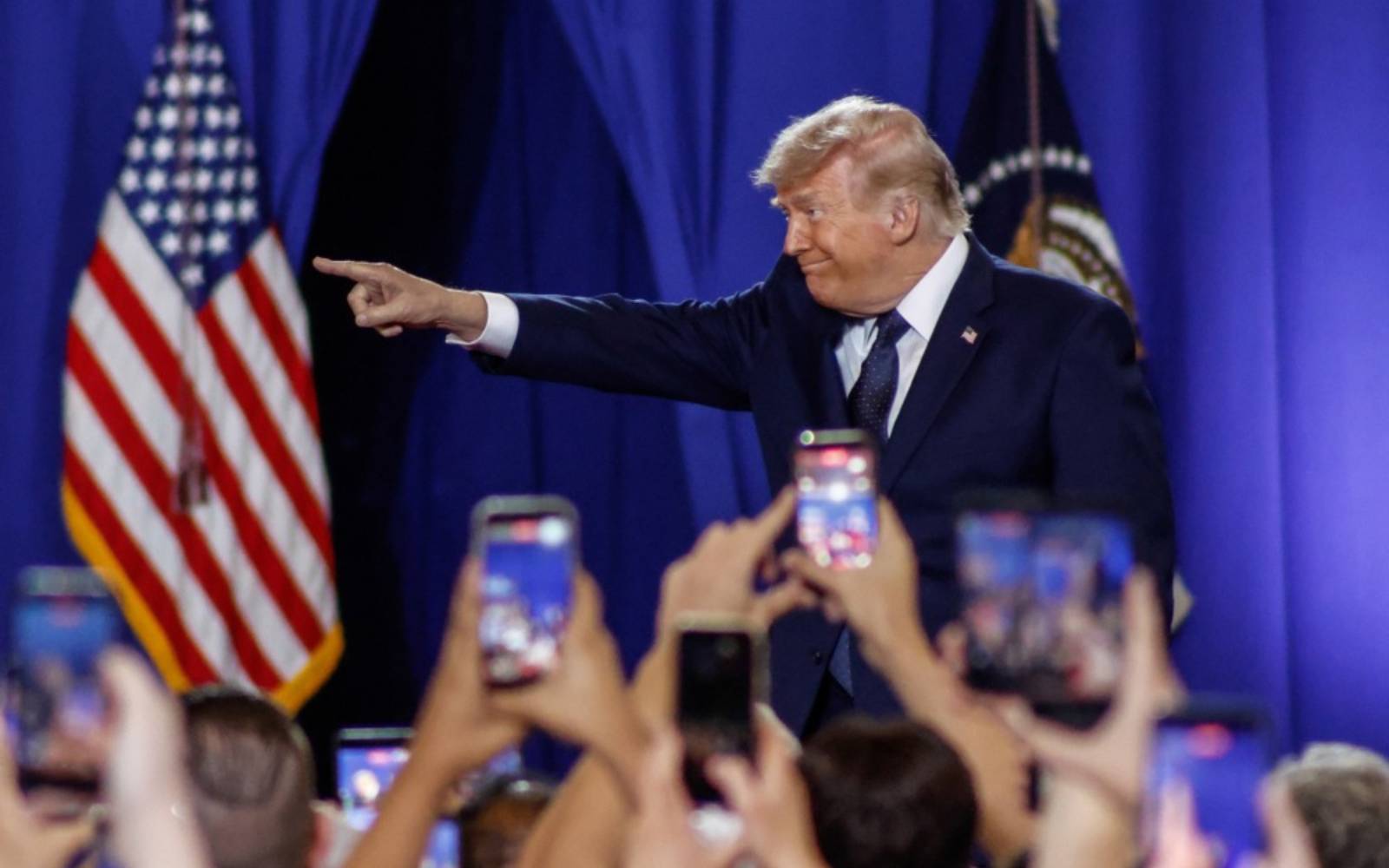 Trump vows to hit campaign trail hard for Republicans in tight midterms