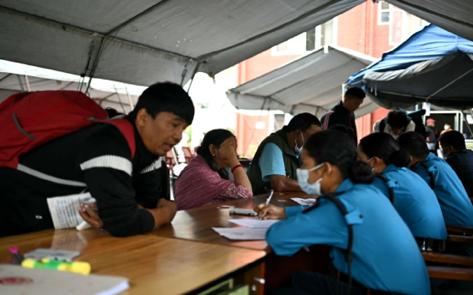 Families descend on Nepal in search of missing tourists