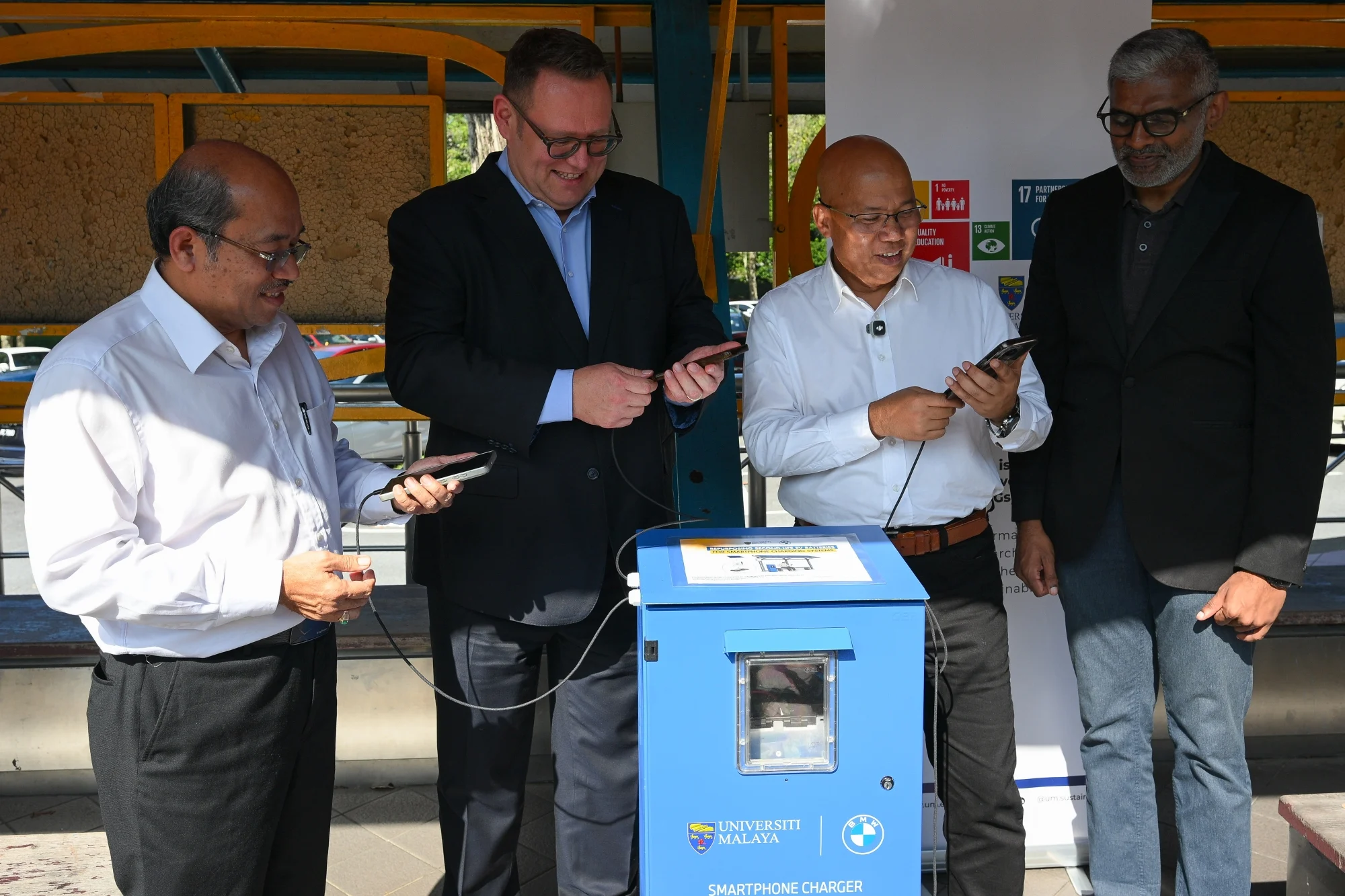 BMW, University Malaya Reuse Old EV Batteries For Campus Chargers, Rural Electrification