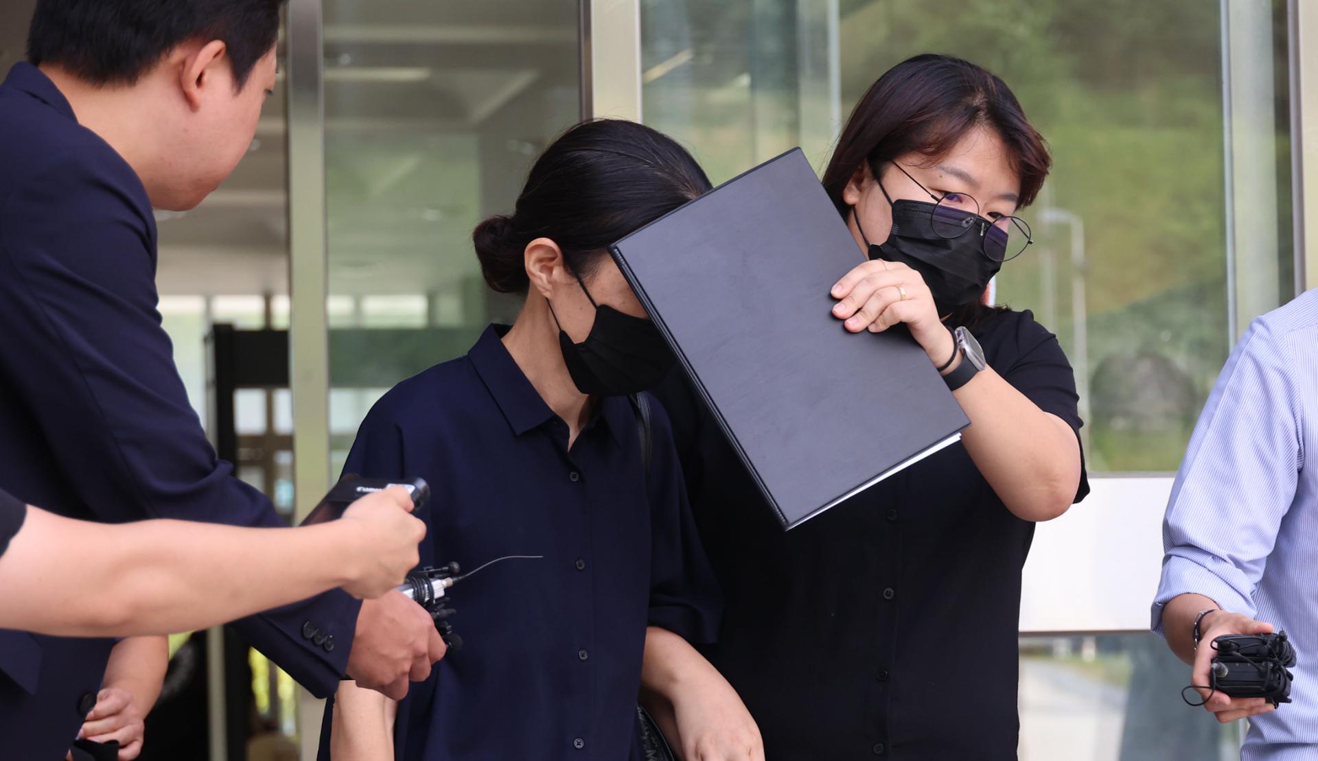 Court holds arrest warrant hearing for woman over fatal abuse of grandson
